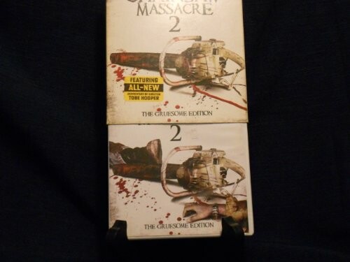 Two DVD covers for 'Chainsaw Massacre 2', featuring gruesome imagery.