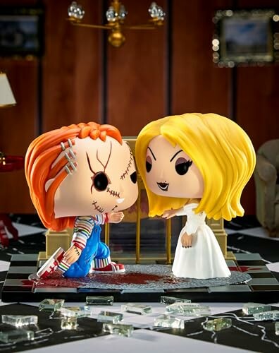 Chucky and Tiffany figurines facing each other in a room.