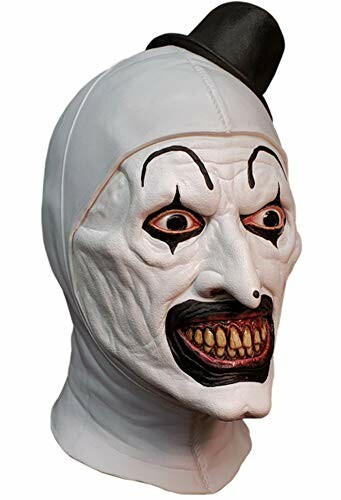 Creepy clown mask with a small top hat and exaggerated features.