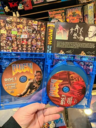 Open DVD case showing AVGN discs and booklet.