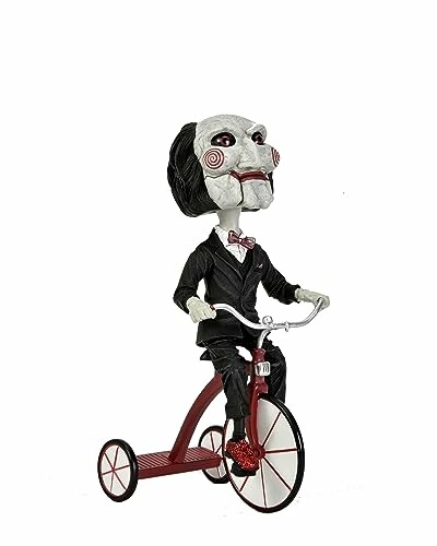 Jigsaw doll riding a tricycle