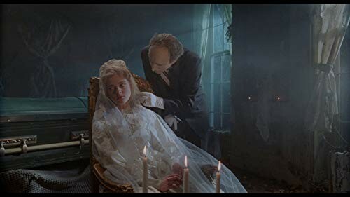 A mysterious gothic scene with a woman in a white dress and a man in a dimly lit room.