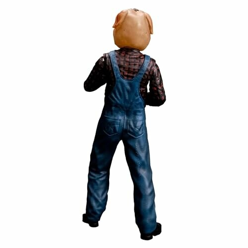 Figure wearing a pig mask and denim overalls