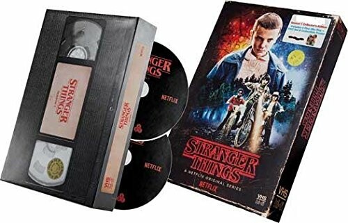 Stranger Things VHS-style box set with DVDs and cover art.