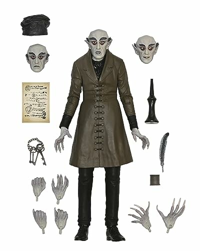 Vampire action figure with interchangeable heads and accessories.